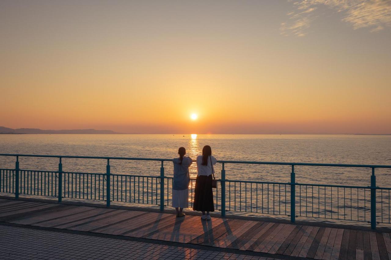Omo Kansai Airport By Hoshino Resorts Izumisano Exterior photo Sunset at the promenade